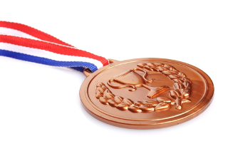 Medalha de bronze dada a terceiro lugar em competições